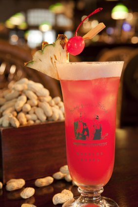 Classic tipple: A Singapore Sling with peanuts at Raffles.