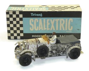 This Scalextric Bentley C64, with instructions and with plastic that is corroded but complete and intact, sold for $200.