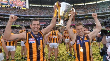 Luke Hodge and Sam Mitchell show of the premiership cup.