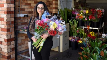 Rita Sakr, owner of Wildrose Florist, says Ready Flowers owes her $22,500. She now works out of her garage.