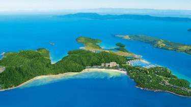 Golf buggy crashes 30 metres down cliff on Hamilton Island ...