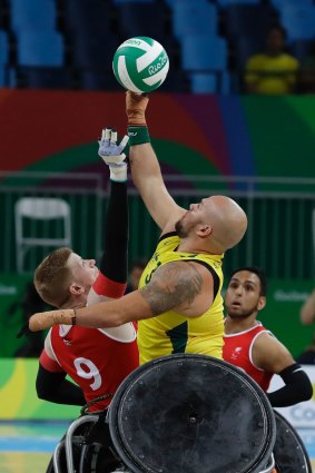 Australia's Ryley Batt fights for the ball with Britain's Jim Roberts in Rio.