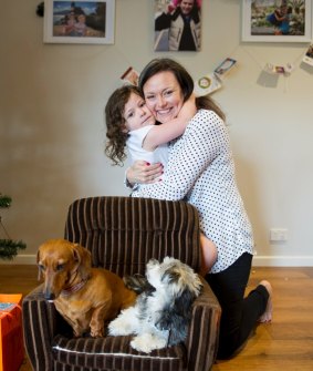 Jocelyn Williams with her daughter Elke, then aged four, pictured last year at home in Canberra. Mrs Williams continues to help fundraise in memory of her late husband Michael.