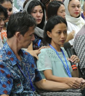 Teachers' aide Ferdinant Tjiong and his wife Sisca.