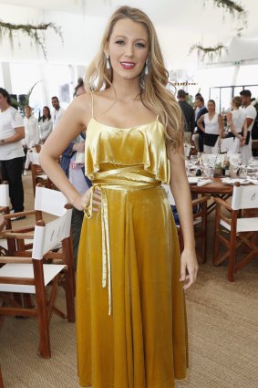 Happy face: Blake Lively at Cannes proving the old ideas about yellow and blonde are passe.