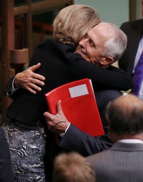 Malcolm Turnbull and Michaelia Cash hug after the ABCC victory.