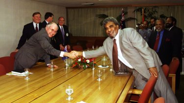 Mr Morauta meeting then prime minister John Howard in Port Moresby.