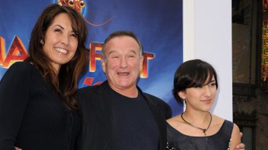 Robin with his wife, Susan, and daughter, Zelda Williams at the  premiere of <i>Happy Feet Two</i> in 2011. 