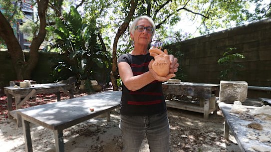 Artist Penny Ryan with some of the ceramic hearts for her forthcoming installation on Human Rights Day. 