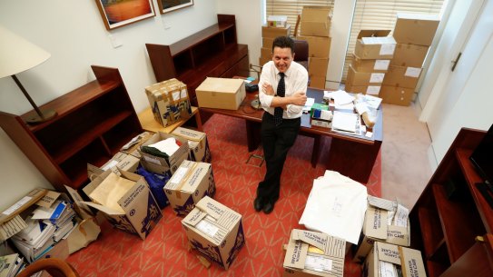 Senator Nick Xenophon with the packing boxes in his office.