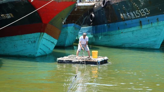 A fisherman at work in Tanmen, in China's southern Hainan Province.