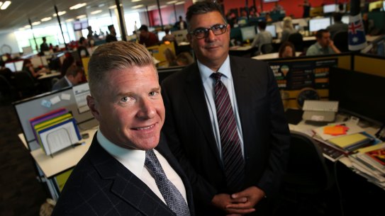 Acquire Learning Group Managing Director John Wall and the company's former advisory council chair Andrew Demetriou in November 2014.
