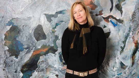 West Australian artist Bec Juniper with one of her abstract landscapes.