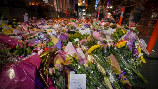 Floral tributes line Bourke Street Mall.