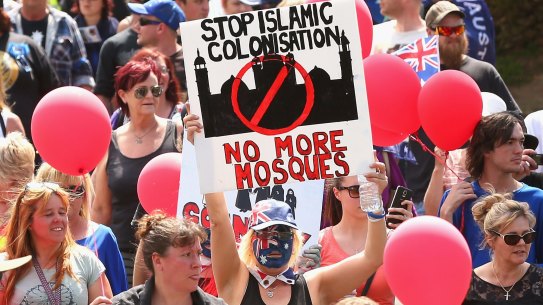 BENDIGO, AUSTRALIA - OCTOBER 10:  Protestors march through the streets of Bendigo on October 10, 2015 in Bendigo, Australia. Protesters gathered showing their discontent with current issues including the building of a mosque in Bendigo, immigration policies and multiculturalism.  (Photo by Quinn Rooney/Getty Images)