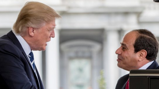 President Donald Trump greets Egyptian President Abdel Fattah el-Sisi as he arrives at the White House in Washington on April 3.