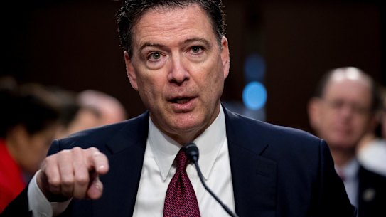 Former FBI director James Comey speaks during a Senate Intelligence Committee.