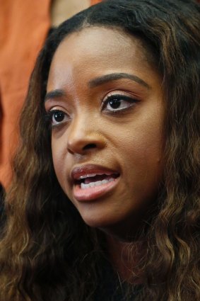 Tamika Mallory, who helped organise the Women's March on Washington, has accused an American Airlines pilot of racial discrimination in kicking her off a flight.