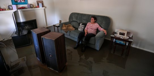 Brian and Glenys Mulcahy preparing their home in Rochester to be inundated by flood waters.