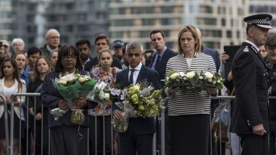 Shadow Home Secretary Diane Abbott, London mayor Sadiq Khan and Home Secretary Amber Rudd take part in a vigil for the victims of the London Bridge terror attacks in Potters Fields Park.