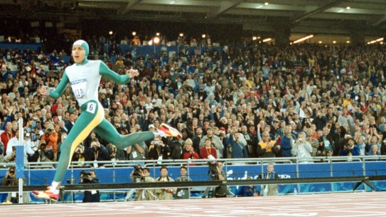 Cathy Freeman crosses the line to win gold at the Sydney 2000 Olympics.