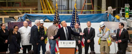 Donald Trump inside the under-construction Trump International Hotel in Washington in March 2016. In 2014, Deutsche Bank agreed to lend the Trump Organisation up to $US170 million to finance the gut renovation of the hotel.  