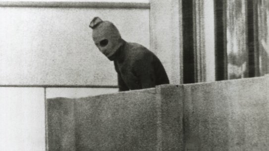 One of the defining images of the Munich hostage siege: one of the Palestinian terrorists.