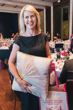 Breast cancer surviver Sonja Loder of Casey with the fundraising cushions at the Pink Lady luncheon for Breast Cancer Network Australia.