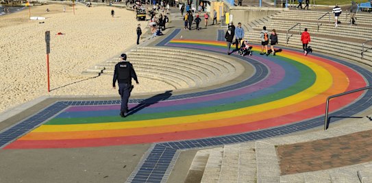 Police patrolling Coogee Beach during Sydney's COVID-19 lockdown. July 17, 2021. Photo: Rhett Wyman/SMH