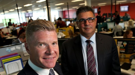 Andrew Demetriou, right, with John Wall, chief executive of Acquire Learning, which has been accused of taking advantage of vulnerable consumers.