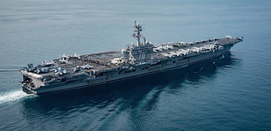 China has labelled the US Navy's decision to sail "without permission" close to an artificial island Beijing claims in the South China Sea as provocative.