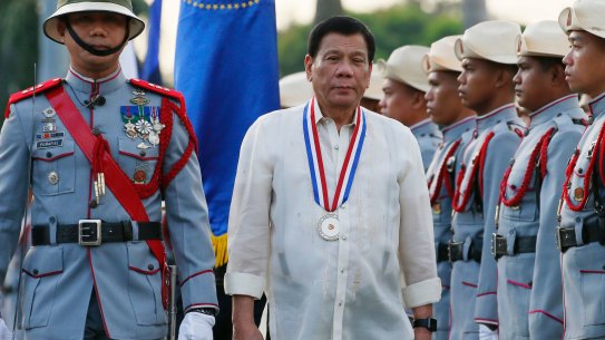 Philippine President Rodrigo Duterte, centre, said his war on drugs will continue for his entire term.