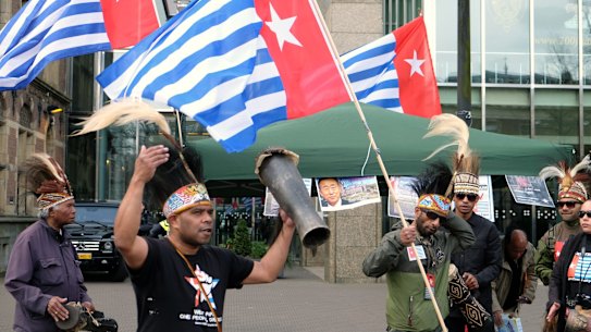 Pro-independence activists protest outside the Dutch parliament in The Hague last month. The demonstration coincided with a visit by Indonesian President Joko Widodo. 