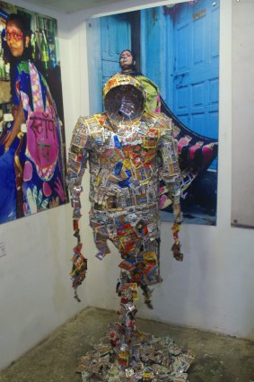 Sachets of chewing tobacco make a point in art in Mumbai's Dharavi slum.