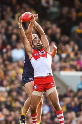 Rising above it: Adam Goodes marks in front of Will Schofield on Sunday.