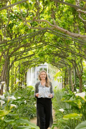 Kathleen Cator in her nashi pear arbour.