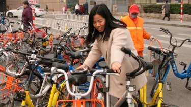 Li Xiang, 28 says she can halve her commuting time by using shared bikes. 