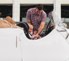While other toddlers go to daycare in the usual people movers or station wagons, Chloe, three, of Barton, is buckled into a vintage British sports car for the trip with dad Peter.
