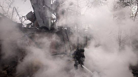 KHARKIV, UKRAINE - APRIL 14: A firefighter works to extinguish a fire at a warehouse caused by recent Russian shelling on April 14, 2022 in Kharkiv, Ukraine. After Russian forces retreated from areas around Kyiv, recent reports point to a new offensive as Russian forces have regrouped in the eastern part of the country bringing fears of an escalation of violence.  (Photo by Chris McGrath/Getty Images) *** BESTPIX ***