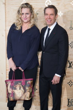 Koons and his wife, Justine Wheeler Koons, at last month's launch with Vuitton at the Louvre.