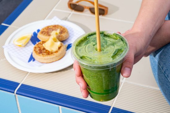 Green smoothie and crumpets at Oh Boy cafe, Andrew (Boy) Charlton Pool Sydney.