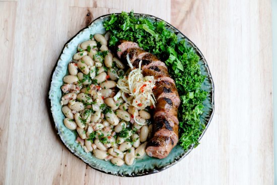 Spiced pork sausage, kale, cannellini beans, daikon, criolls. 