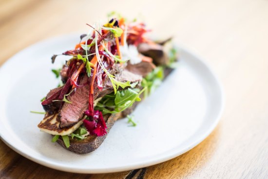 Lamb and haloumi open rye with beetroot slaw.