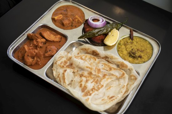 Roti with a selection of Sri Lankan curries.