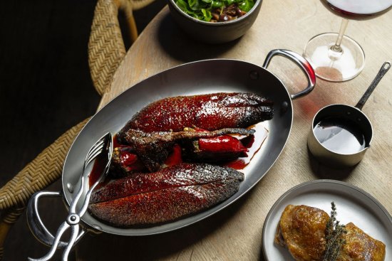 Go-to dish: The duck for two's roasted breasts and confit thighs are presented separately.