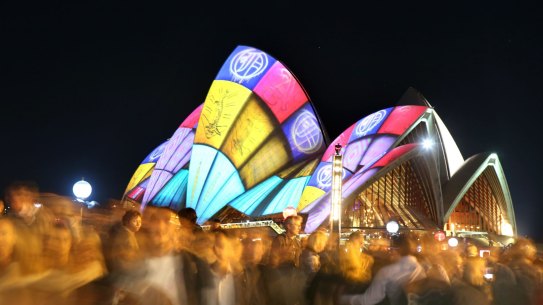 Crowds filter through the city during the 2016 Vivid Sydney Festival. 