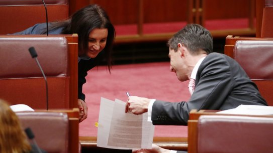 Minister for Education and Training Simon Birmingham  and Tasmanian senator Jacqui Lambie discuss the detail in the Senate.