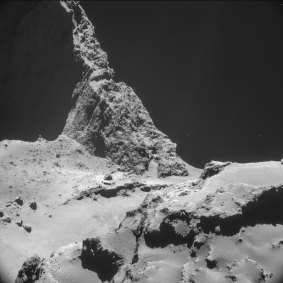 The face of a comet: Rosetta's NAVCAM takes a picture of the boulder-strewn neck region of Comet 67P.