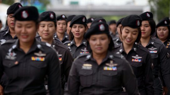 Police officers deployed outside the Thai Supreme Court ahead of the scheduled  verdict on charges accusing former Prime Minister Yingluck Shinawatra of negligence in implementing a rice subsidy.