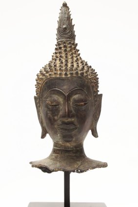 A bronze Buddha head from Thailand, 16th century.
